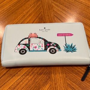Kate Spade Light Blue Travel Wallet with Floral Car and Sign